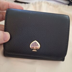 kate spade Black Pebbled Leather Trifold Wallet with Gold Spade Emblem